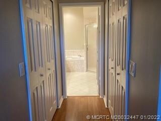 THIS IS PART OF THE MASTER SUITE 2 CLOSETS. GOES INTO MASTER BATHROOM, ROMAN TUBD WITH SEPERATE SHOWER. DOUBLE SINKS. LIGHT AND AIRY. PLANTATION SHUTTERS ON THE WINDOWS WITH A FAN.