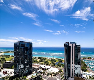 Awesome ocean, Ala Moana Beach Park & coastline views from the living room and both bedrooms