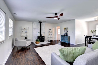 704 Athens Avenue in Hampton Va now has an open concept floorplan to enjoy entertaining. The woodburning stove will keep you cozy in the winter months.