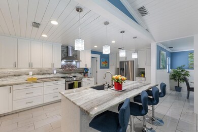 Luxurious kitchen with huge island and double oven