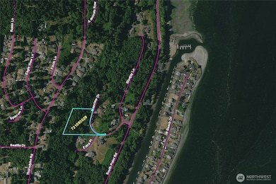 This lot is located in a quiet residential area. So. Pt. Road and  Maxview Road both dead-end so traffic is minimal. The private beach is just above the sand spit at the top-right of this photo.