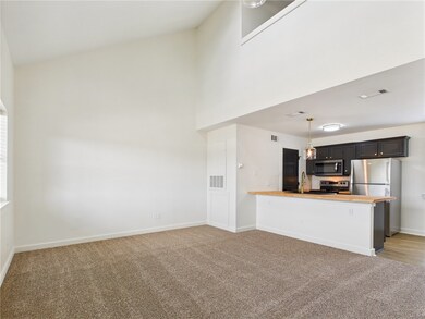 Kitchen featuring stainless steel appliances, ligh