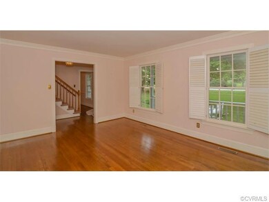 Large Formal Living Room with Crown Moulding and H