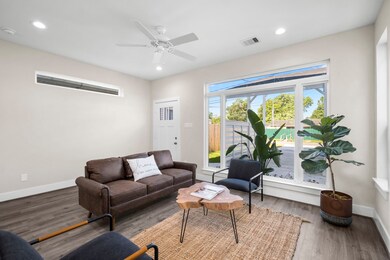 View into living area. Large window.