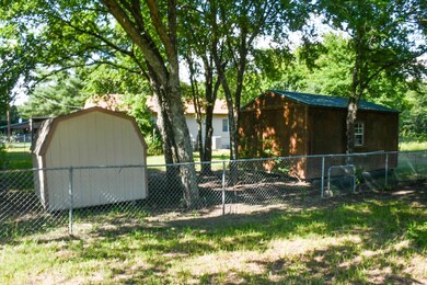 View of yard with a shed