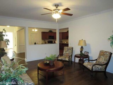 Living Room. Another View of Living Room open to dining area and kitchen.