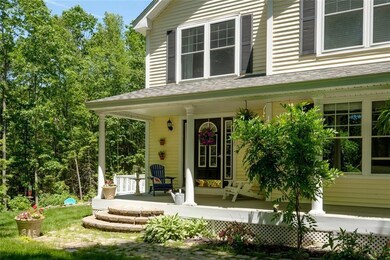 Covered Front Porch for those warm...