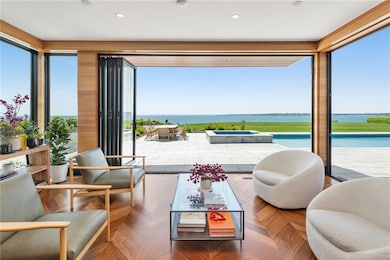 Sitting room in Open Kitchen to patio.