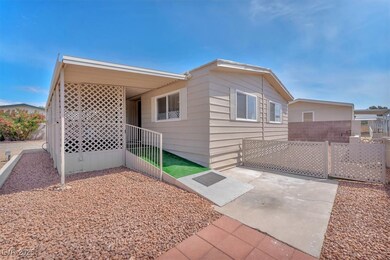 View of property exterior featuring fence and a pa