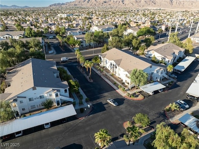 Aerial view of residential area featuring a mounta