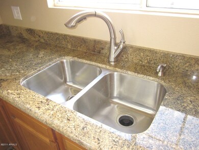 New granite, sink, and faucet