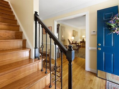 Beautifully-kept entry foyer, with a view into the
