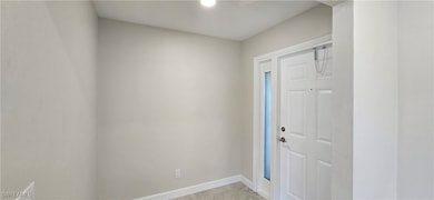 Foyer Features Recessed Lighting & Tile Floor