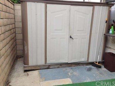 shed permitted for laundry area.  Extra monthly pa
