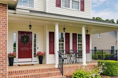 Beautiful Brick/Aggregate Wrap Around Front Porch