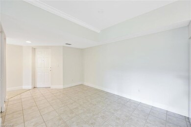 Dining room is just off the kitchen. Notice the cove ceilings.