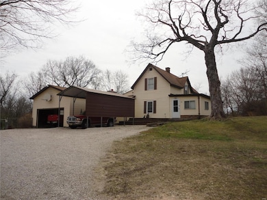 Car port will stay, Garage is spacious