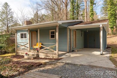Home includes carport with side entry into kitchen