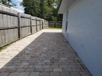 Paver lined big toy area.