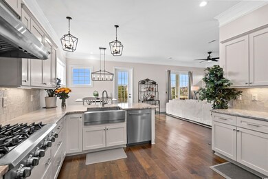 Kitchen featuring pendant lighting, light stone co