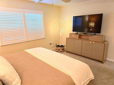 Plantation shutters and warm earth tone paint colors