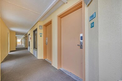 Corridor with carpet floors