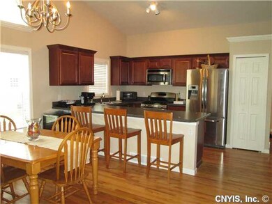 Dining Room. Hardwood floors in foyer, kitchen & d