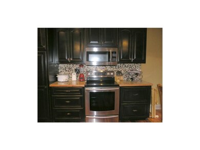 Custom cabinets, built-in panrty, stainless applia