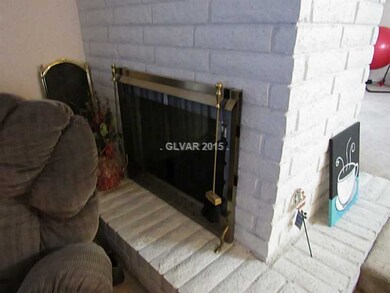 Living Room. two sided fireplace in both living ro