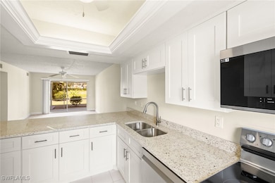 Kitchen is open to the living area with room for b