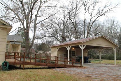 2 car carport with storage room