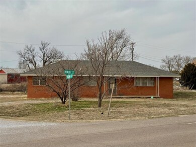 Ranch-style house featuring brick siding  Love the