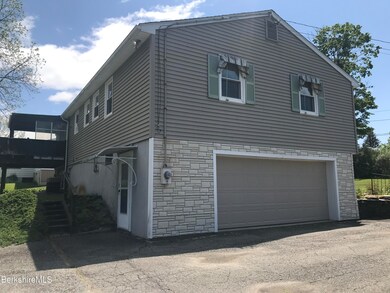 Raised ranch w/oversize garage