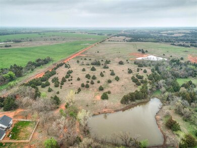 Birds eye view of property with a rural view and a