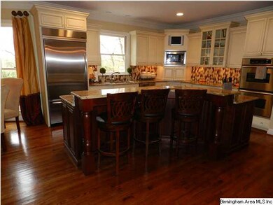 Kitchen with granite countertops and intricate sto