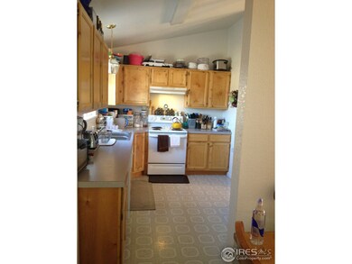 Light Kitchen with Knooty pine Cabinets