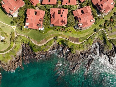 The pristine lava rock provides a protective shoreline to Wailea Point with world-class beaches