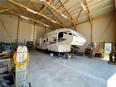 Huge pole barn with 20 ft doors and heated!