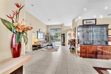 living room entry with clear view of backyard