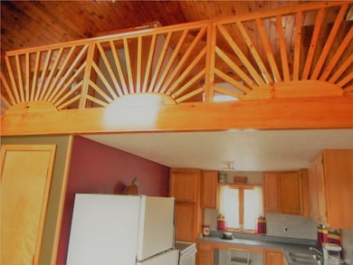 Handmade railing looking up to the loft