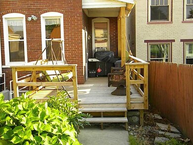 Exterior Back. DECK WITH ONE UNIT IN REAR