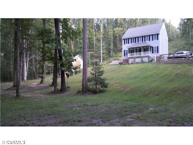Exterior Front - Privacy, fenced yard, woods surro