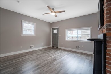 Living room. New windows/blinds.