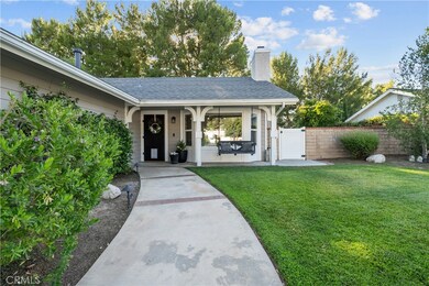 Adorable porch with swing.