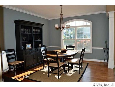 Dining Room The natural  light and hardwoods in th
