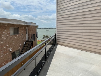 Peekaboo view of lake from living room and first F