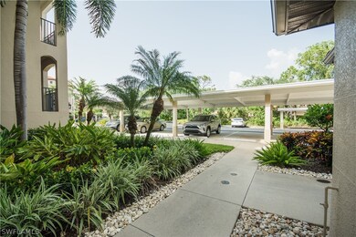 Landscaped walkway to elevator from parking spot.
