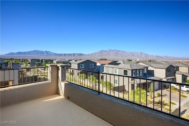 Balcony with a residential view and a mountain vie