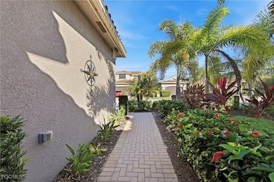 View of property exterior with stucco siding