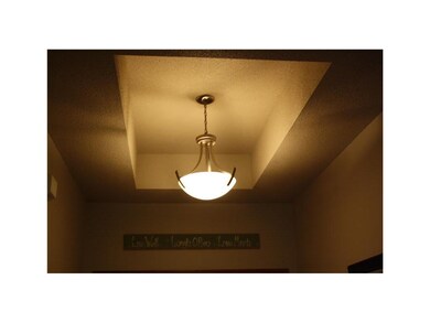 Interior Space/Layout. Tray ceilings with brush ni